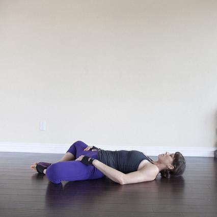 Supta Baddha Konasana "Reclined Bound Angle Pose"